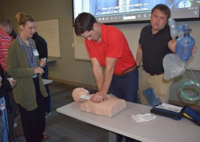 photo of students learning CPR