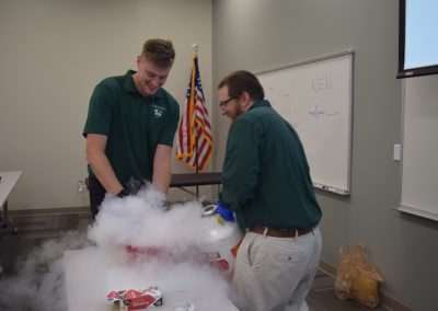 photo of student and professor using liquid nitrogen