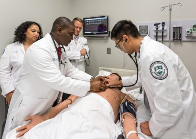 photo of doctors examining a patient